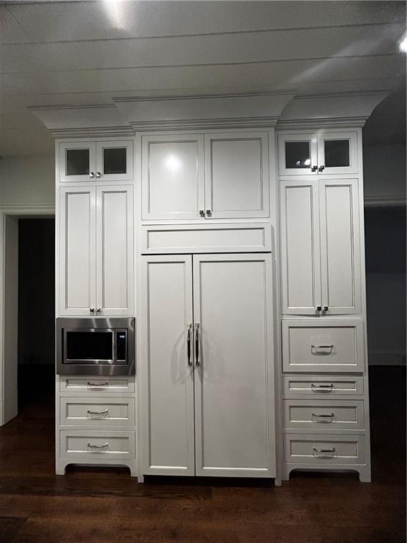 Undisclosed Address Milton, GA 30004 - Photo 82 of 118 a view of walk in closet with empty racks