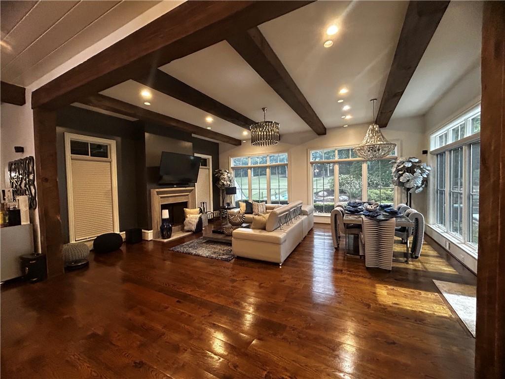 Undisclosed Address Milton, GA 30004 - Photo 90 of 118 a living room with fireplace furniture and a large window