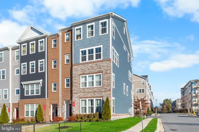 a front view of a building with garden