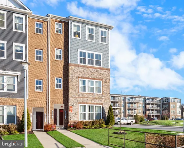 a view of a building with a yard