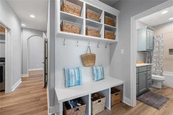 a kitchen with a stove and a microwave oven