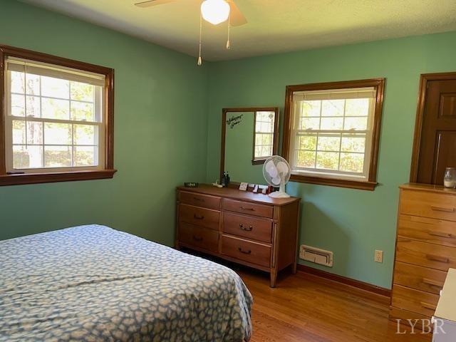 2393 Grit Road Hurt, VA 24563 - Photo 14 of 22 a bedroom with a bed and a window