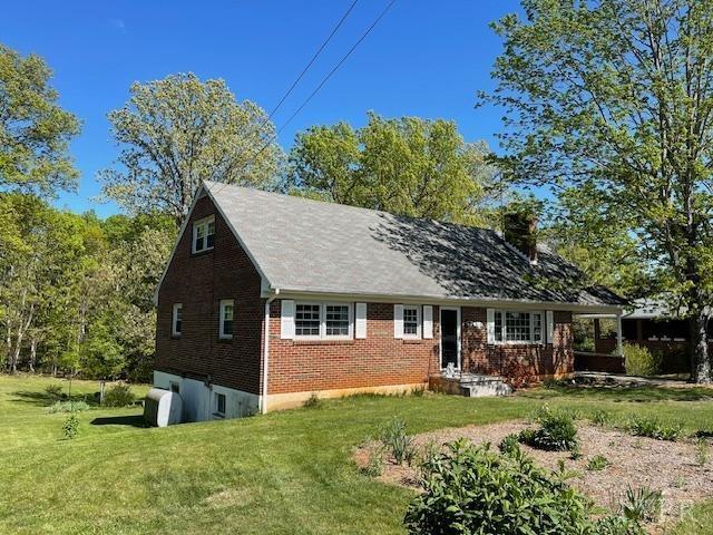 2393 Grit Road Hurt, VA 24563 - Photo 2 of 22 a front view of a house with a yard