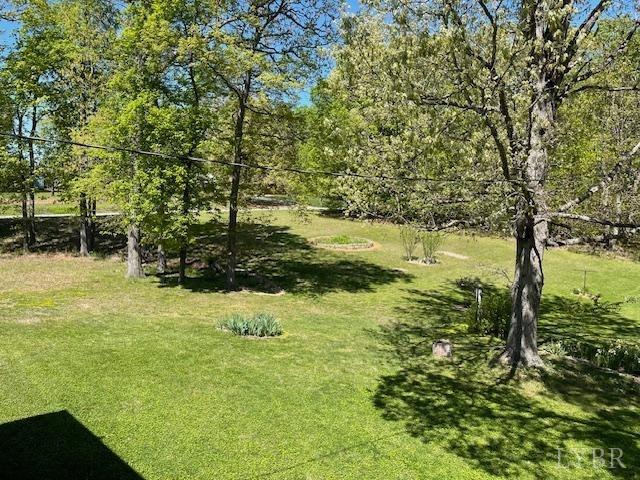 2393 Grit Road Hurt, VA 24563 - Photo 6 of 22 a backyard of a house with lots of green space
