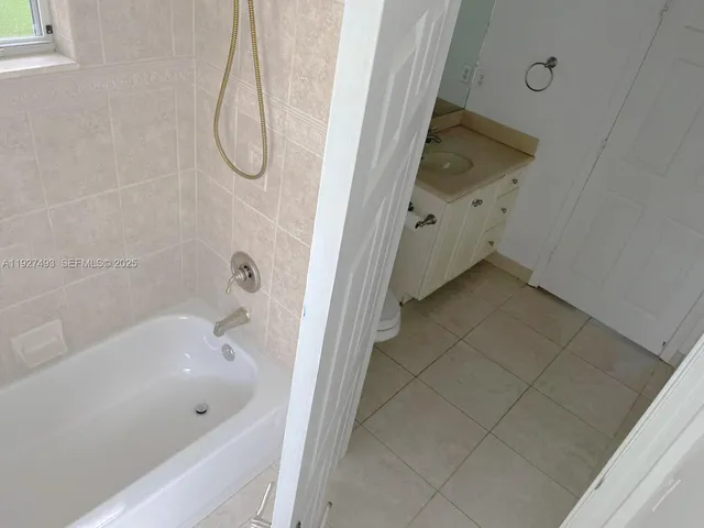 a bathroom with a bathtub