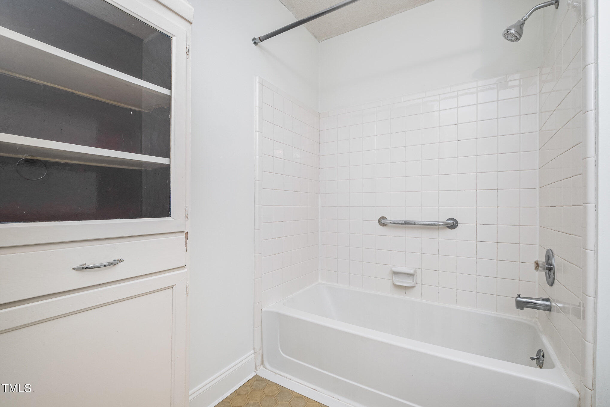 2213 Alpine Road Durham, NC 27707 - Photo 11 of 18 a bathroom with a bathtub