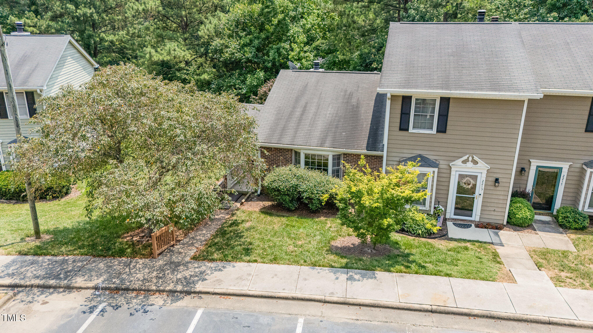 2213 Alpine Road Durham, NC 27707 - Photo 14 of 18 front view of a house with a yard