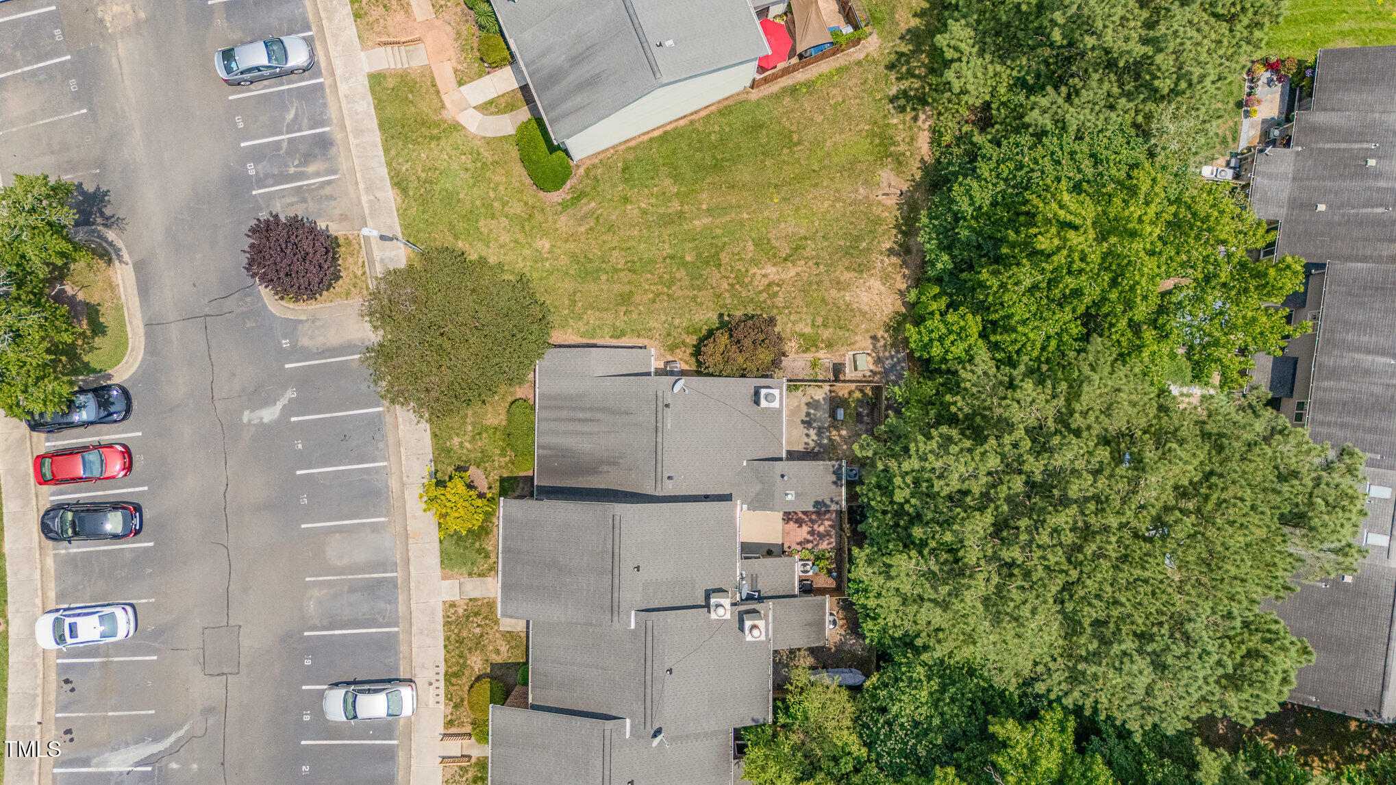 2213 Alpine Road Durham, NC 27707 - Photo 17 of 18 an aerial view of a residential apartment building with a yard