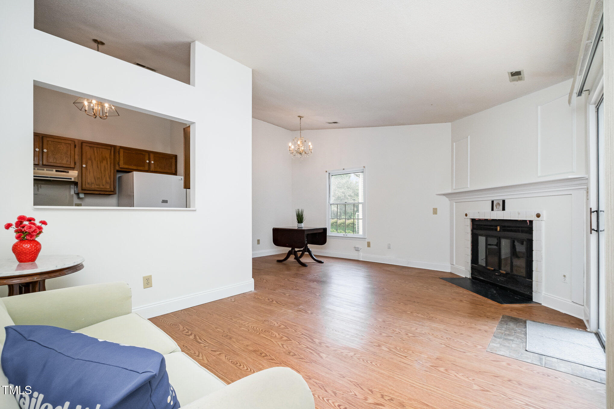 2213 Alpine Road Durham, NC 27707 - Photo 4 of 18 a living room with furniture and a fireplace