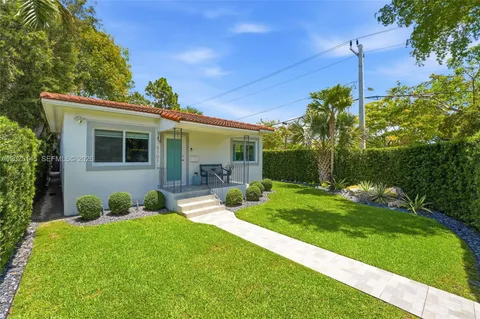 a house view with a garden space