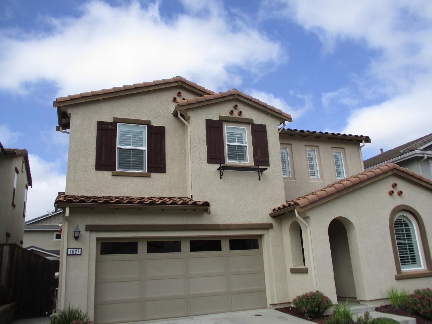 a front view of a house with windows