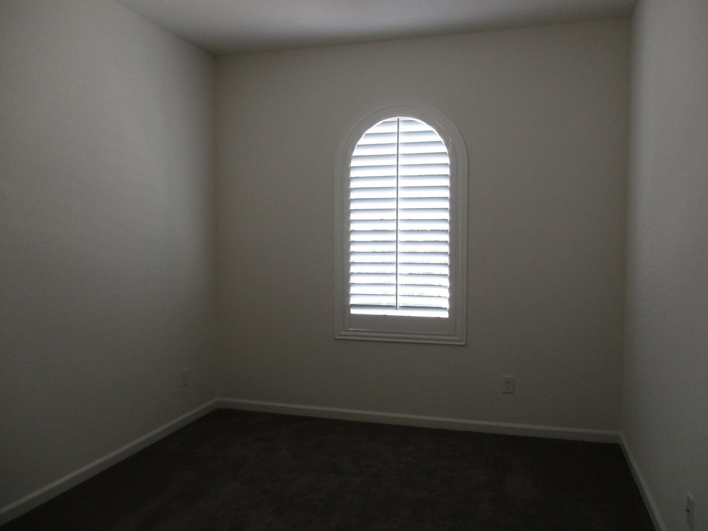 1027 Ruby Way Gilroy, CA 95020 - Photo 13 of 25 an empty room with a window
