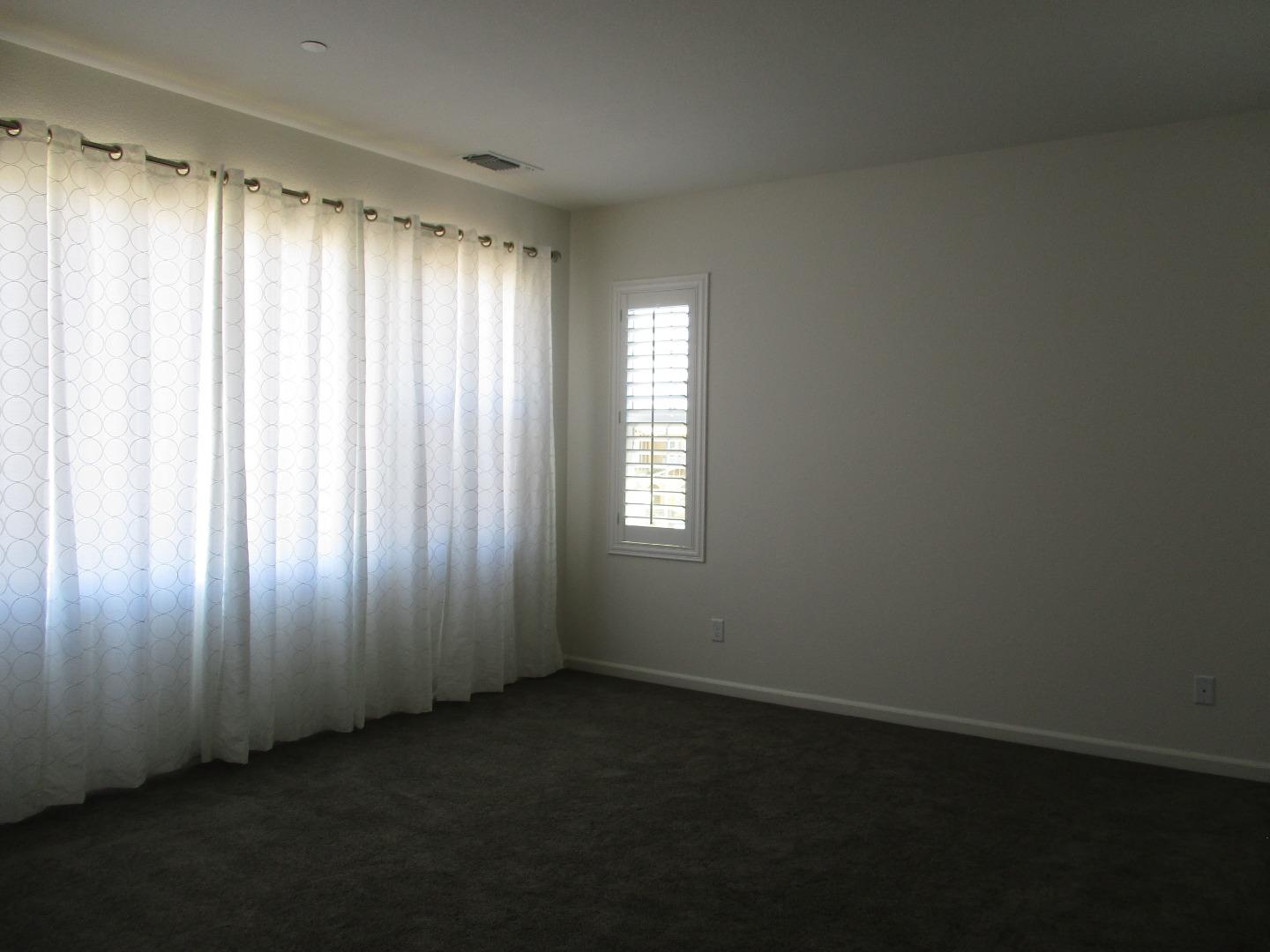 1027 Ruby Way Gilroy, CA 95020 - Photo 17 of 25 an empty room with a window