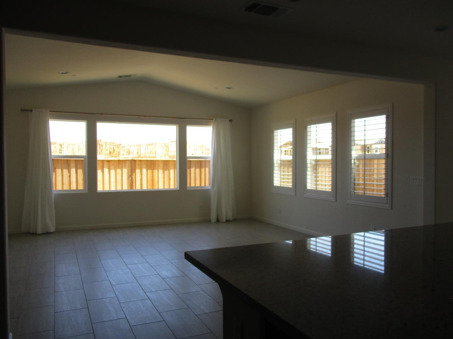 1027 Ruby Way Gilroy, CA 95020 - Photo 6 of 25 a view of an empty room with a window