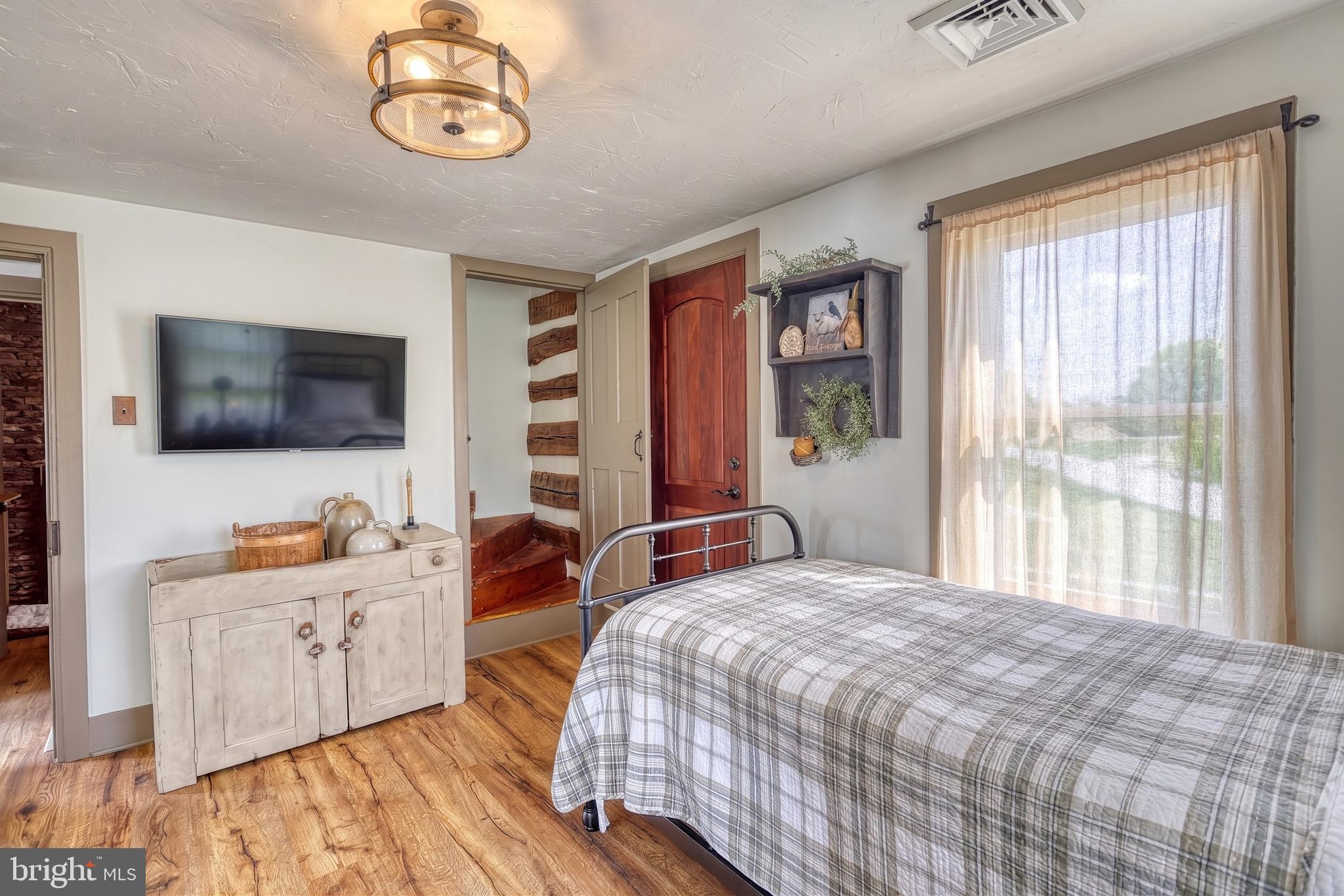 2415 Clearview Lane Spring Grove, PA 17362 - Photo 24 of 149 a bedroom with a bed and a flat screen tv