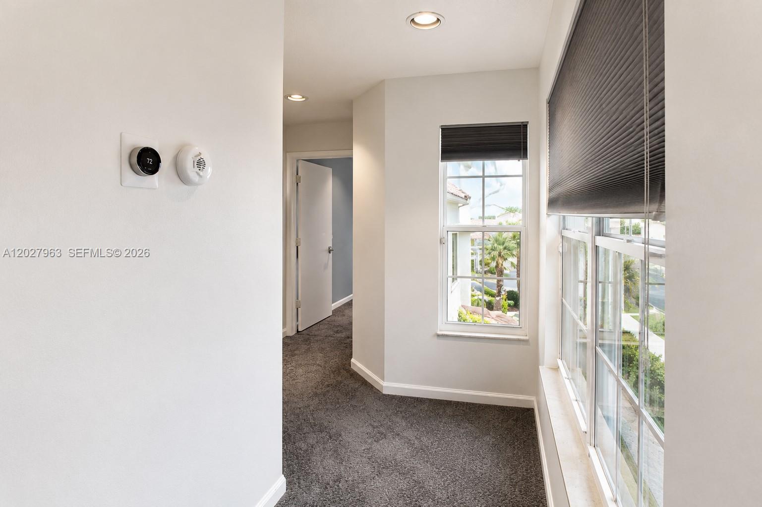 6646 Northwest 25th Terrace Boca Raton, FL 33496 - Photo 24 of 48 a view of an empty room with a window