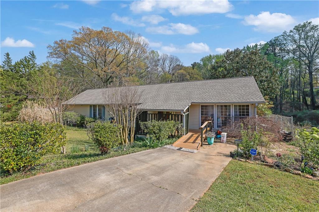 3285 Howell Circle Duluth, GA 30096 - Photo 2 of 33 a view of a house with backyard and a tree