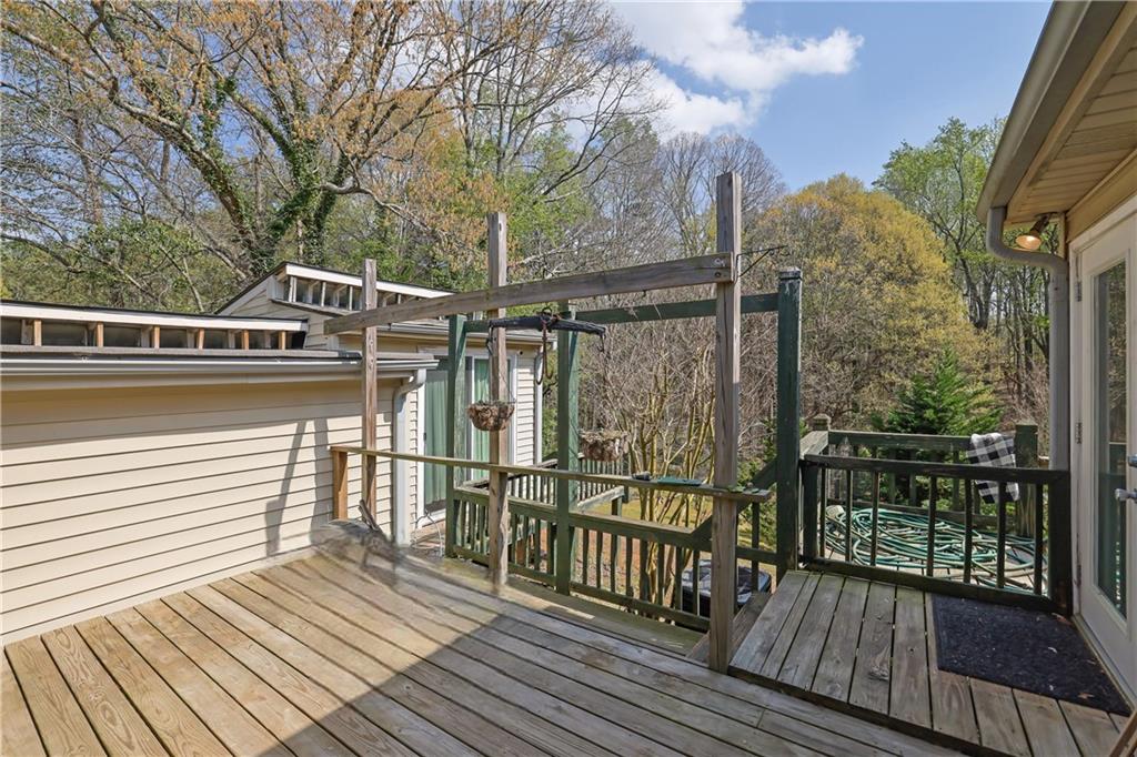 3285 Howell Circle Duluth, GA 30096 - Photo 25 of 33 a view of a balcony with wooden floor and fence