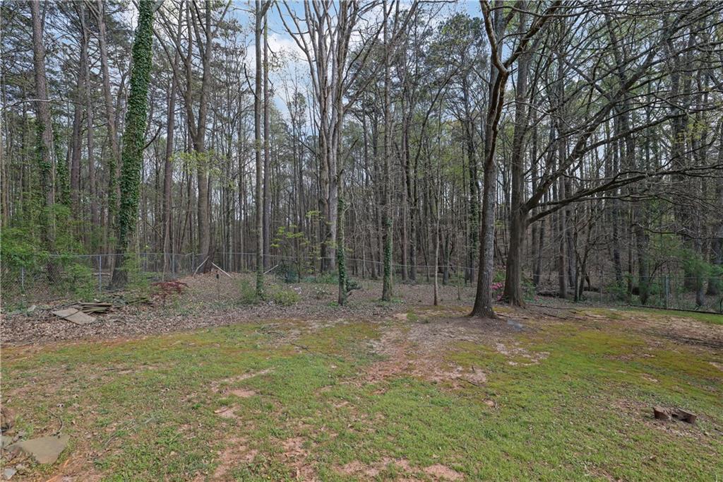 3285 Howell Circle Duluth, GA 30096 - Photo 26 of 33 a view of a forest with trees in the background