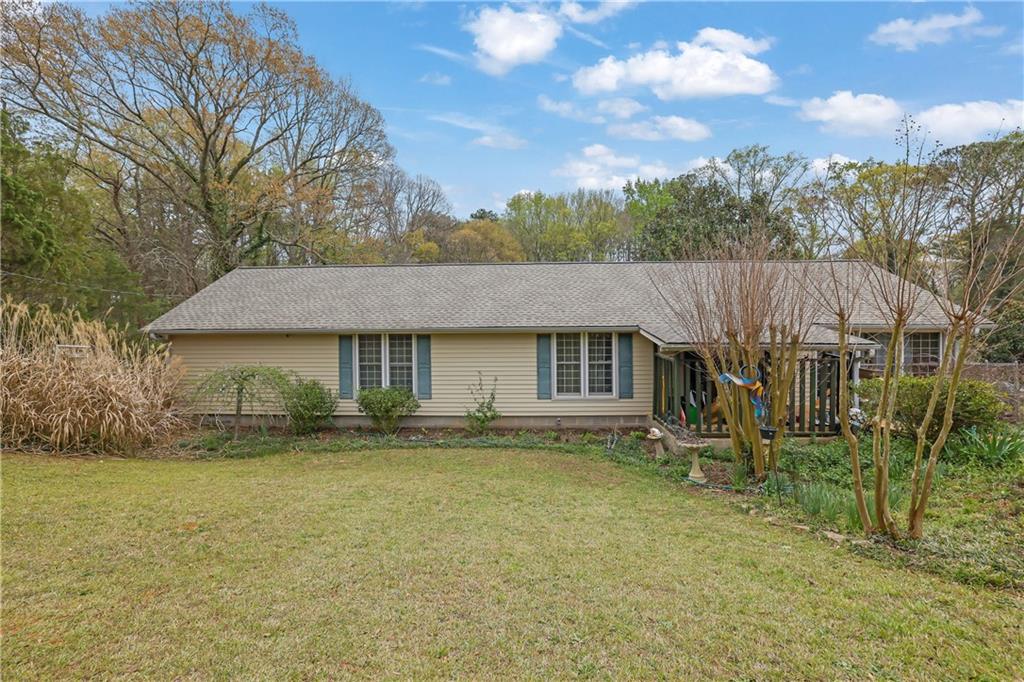 3285 Howell Circle Duluth, GA 30096 - Photo 29 of 33 front view of a house with a yard