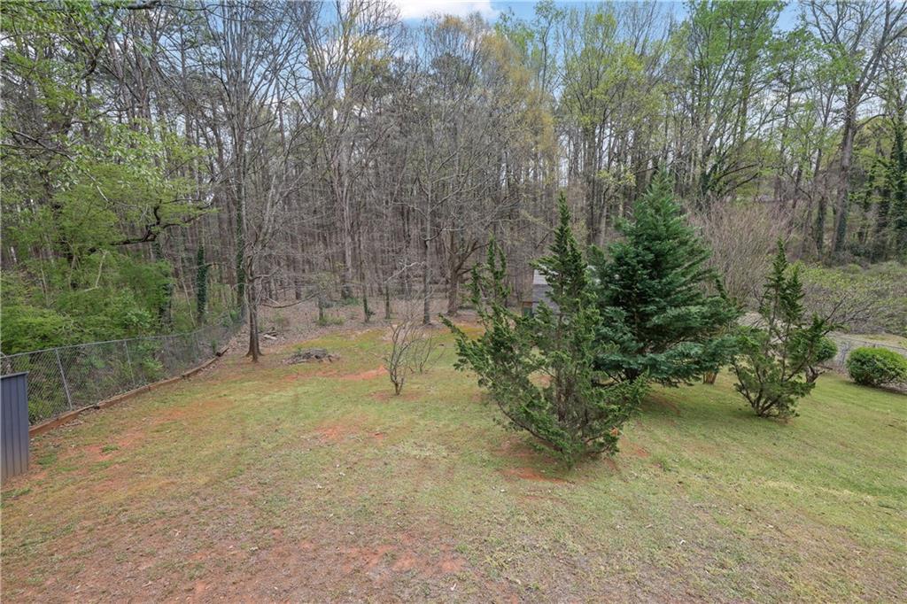 3285 Howell Circle Duluth, GA 30096 - Photo 30 of 33 a view of a yard with trees