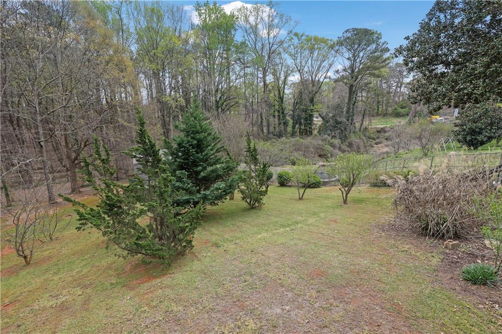 3285 Howell Circle Duluth, GA 30096 - Photo 31 of 33 a view of a yard with trees