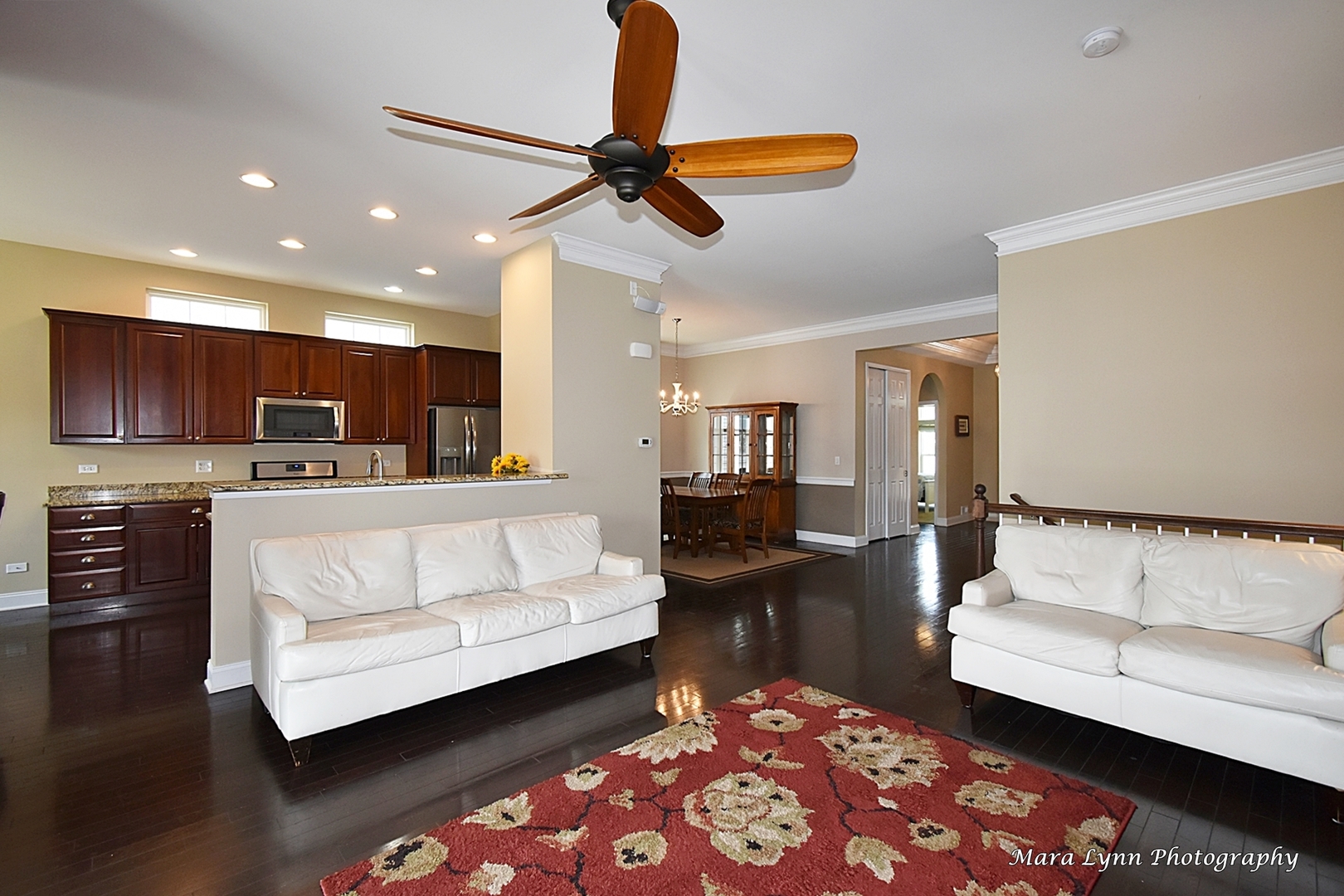 3881 Valhalla Drive Elgin, IL 60124 - Photo 17 of 39 a living room with furniture and kitchen view