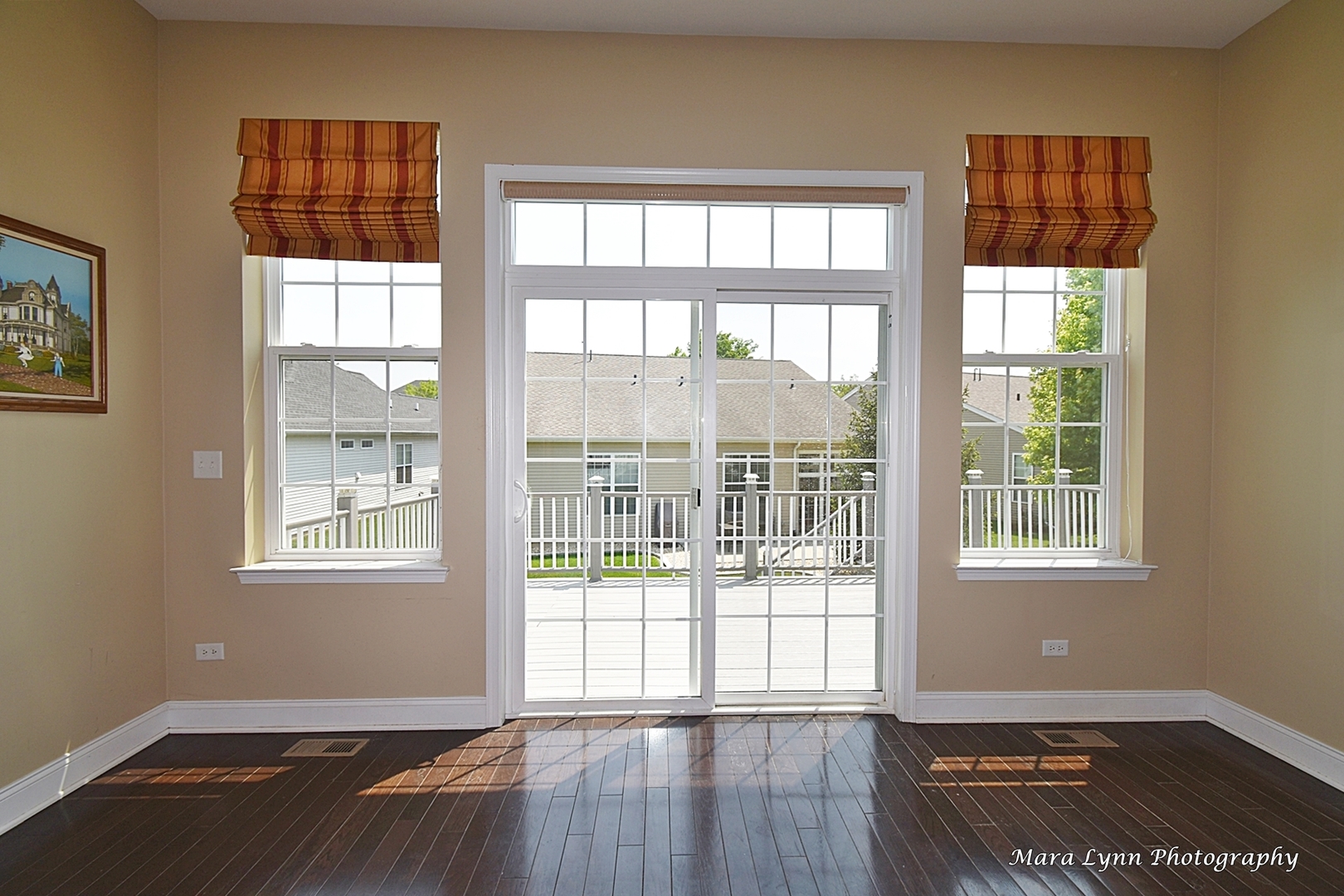 3881 Valhalla Drive Elgin, IL 60124 - Photo 18 of 39 a view of an empty room with wooden floor and a window
