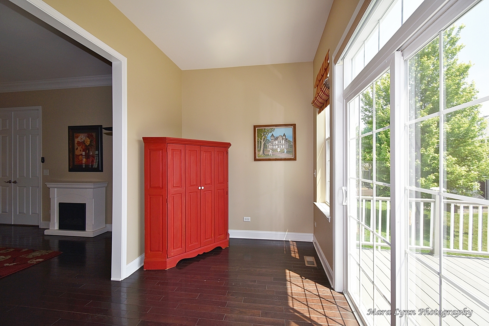 3881 Valhalla Drive Elgin, IL 60124 - Photo 19 of 39 a view of a livingroom with wooden floor and windows