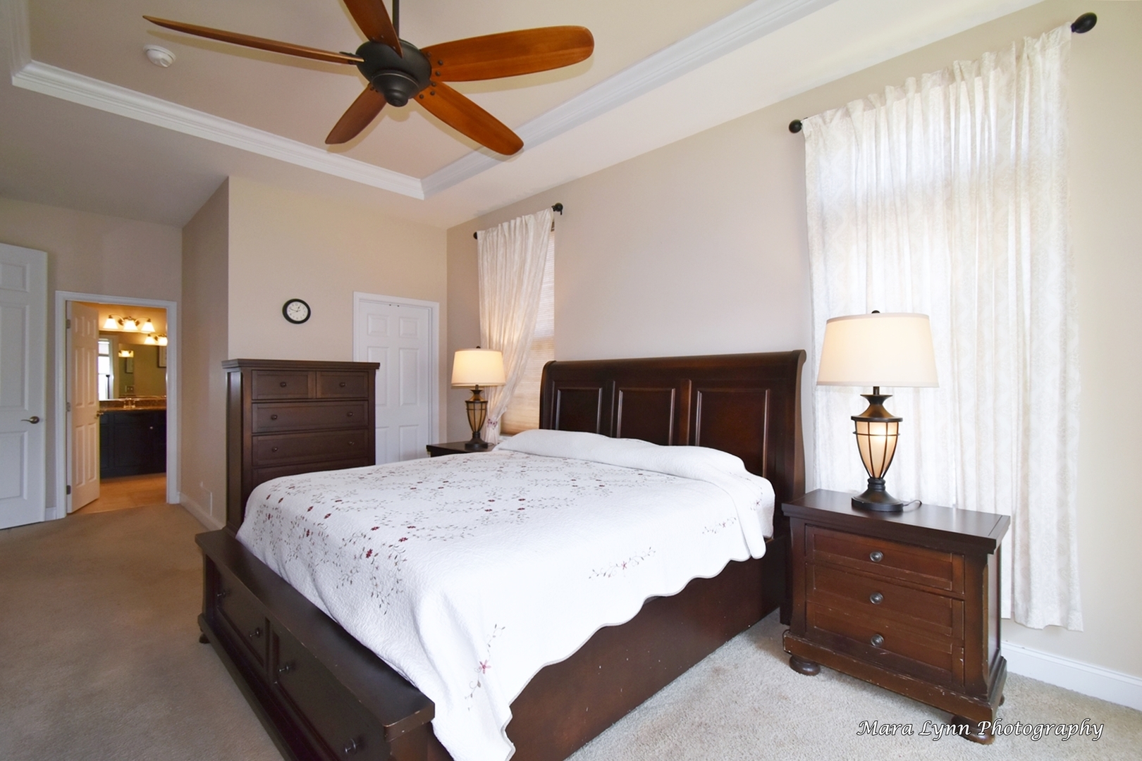3881 Valhalla Drive Elgin, IL 60124 - Photo 21 of 39 a bedroom with a bed and a chandelier