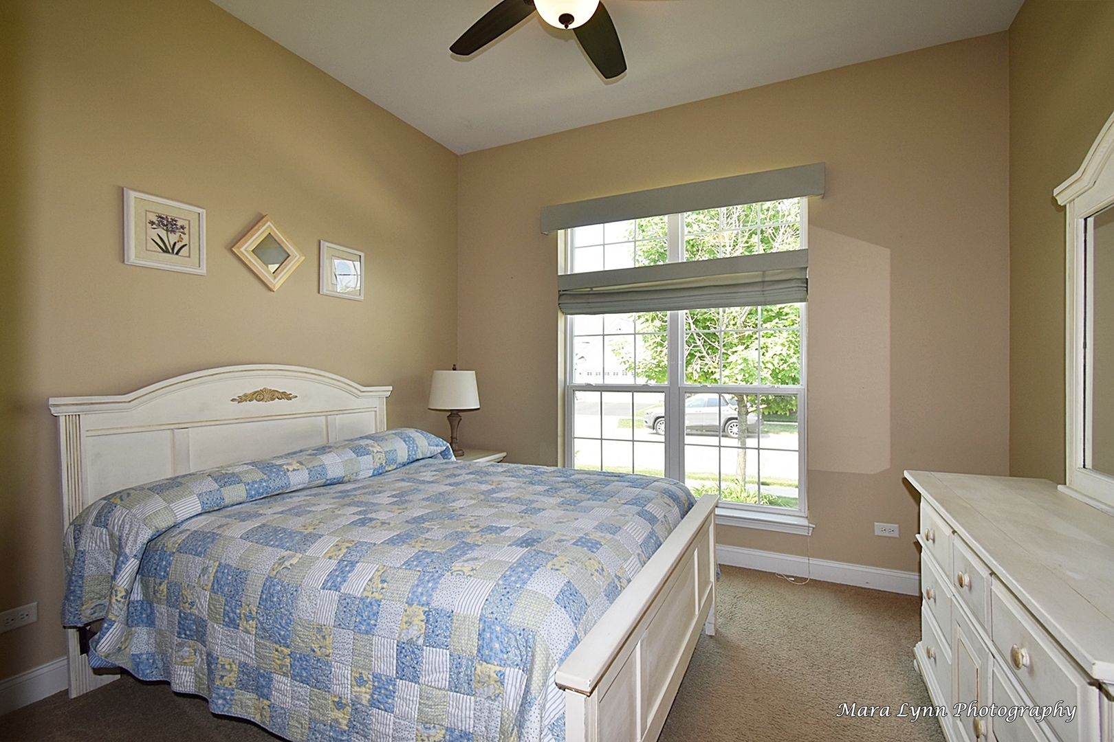 3881 Valhalla Drive Elgin, IL 60124 - Photo 23 of 39 a bedroom with a bed and a chandelier