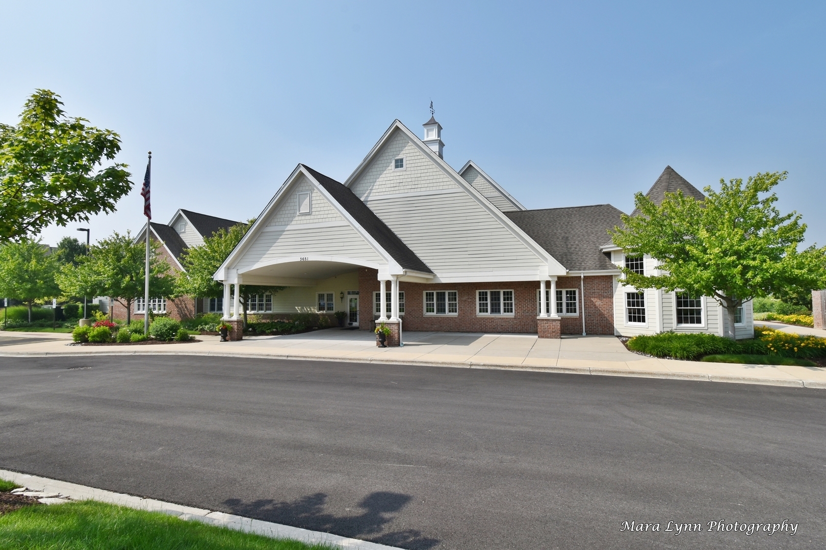 3881 Valhalla Drive Elgin, IL 60124 - Photo 34 of 39 a front view of a house with a yard and garage