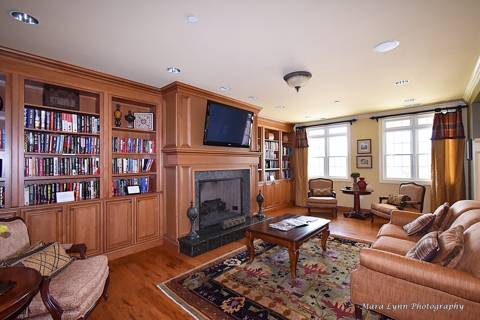 3881 Valhalla Drive Elgin, IL 60124 - Photo 37 of 39 a living room with furniture fireplace and a window