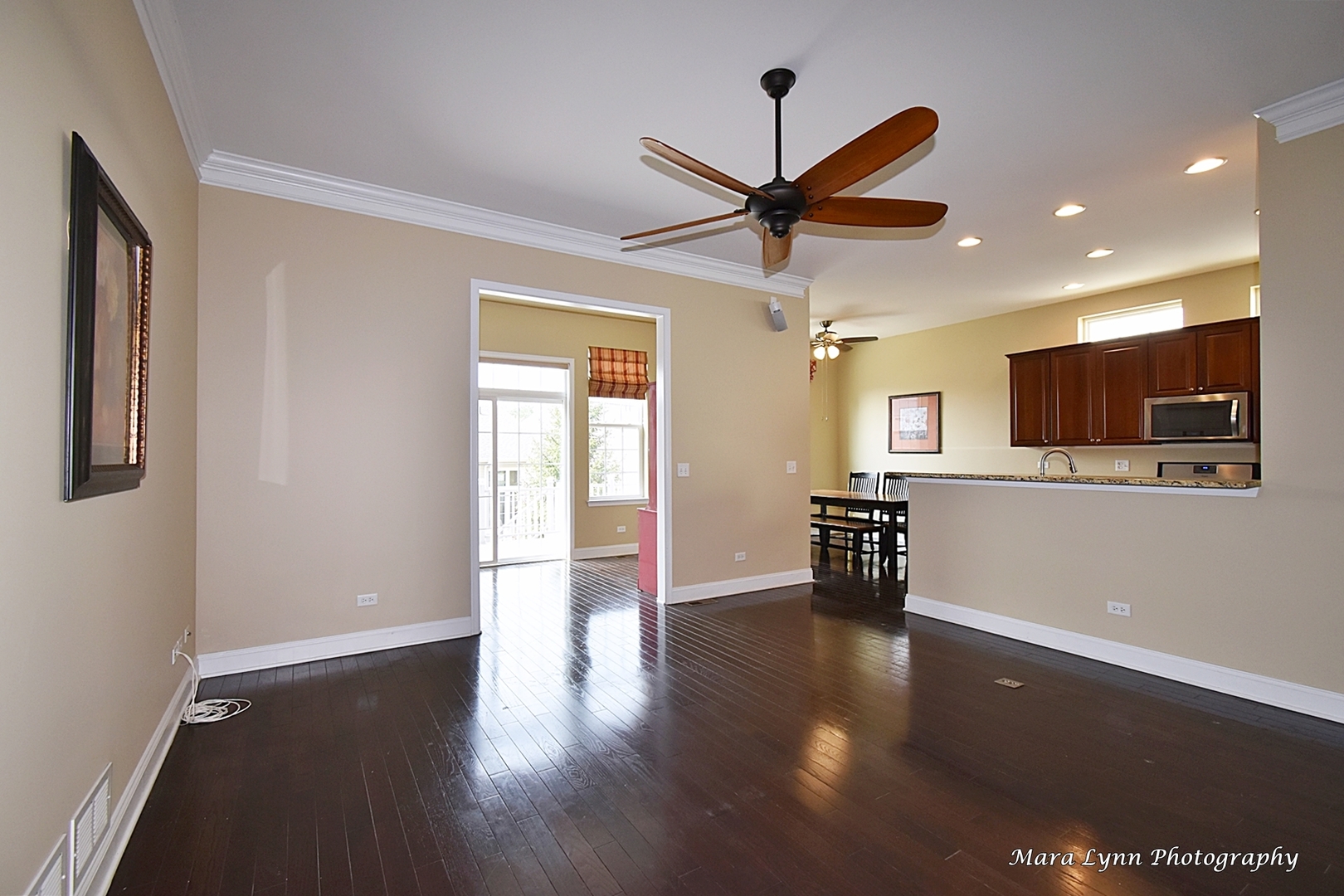 3881 Valhalla Drive Elgin, IL 60124 - Photo 9 of 39 a view of an empty room with wooden floor and a window