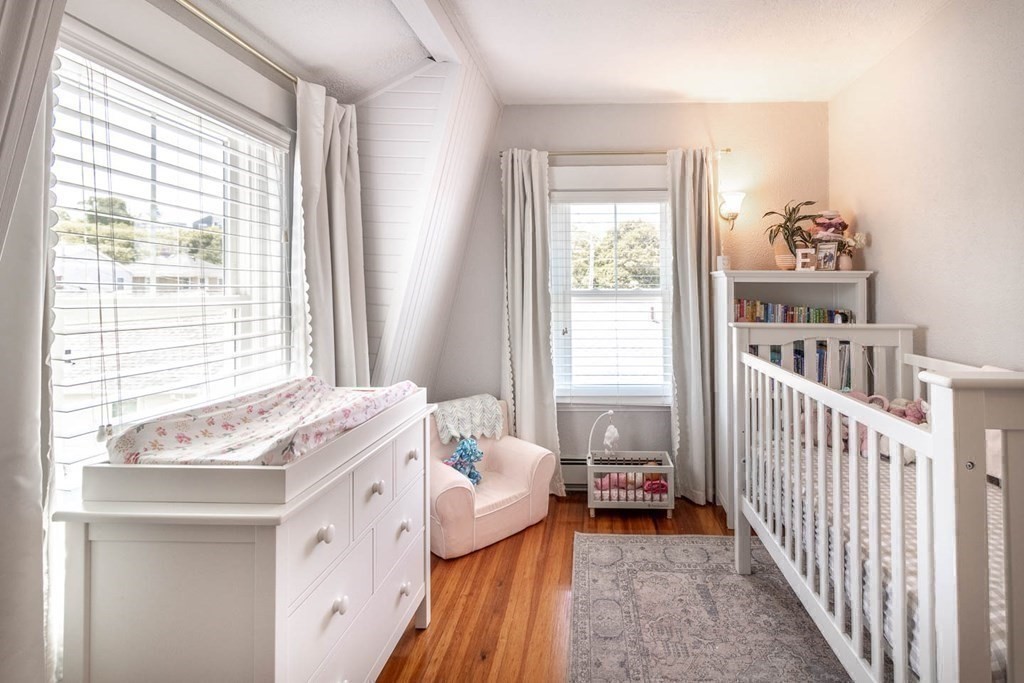 203 Samoset Avenue Hull, MA 02045 - Photo 26 of 39 a bedroom with a bed and a window