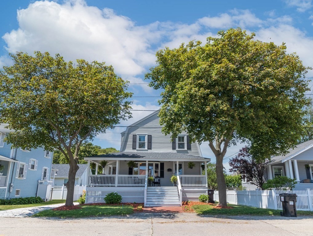 203 Samoset Avenue Hull, MA 02045 - Photo 4 of 39 a front view of a house with a garden