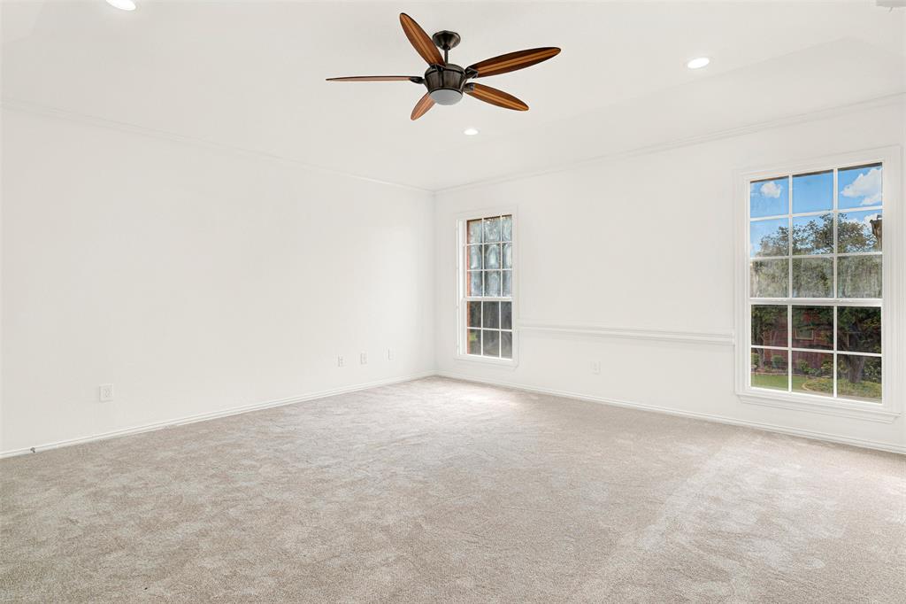 5729 Ridgehaven Drive Plano, TX 75093 - Photo 14 of 21 an empty room with cabinet and windows