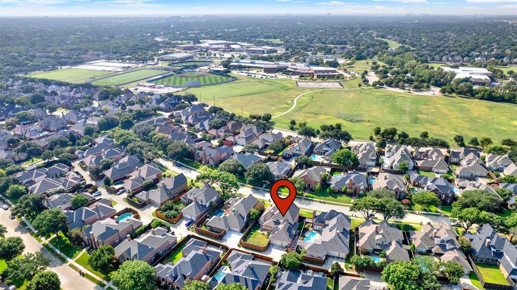 5729 Ridgehaven Drive Plano, TX 75093 - Photo 20 of 21 an aerial view of a houses with a swimming pool yard and outdoor seating