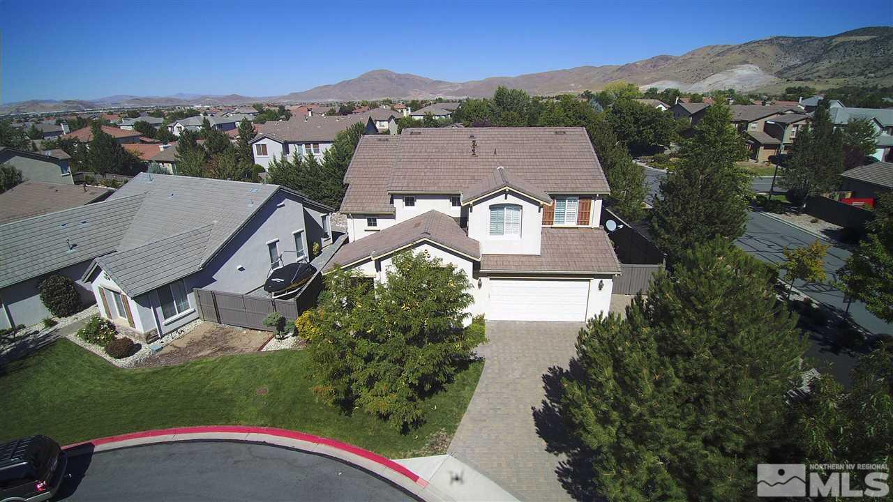 581 Alydar Court Reno, NV 89521 - Photo 2 of 22 an aerial view of a house with a garden