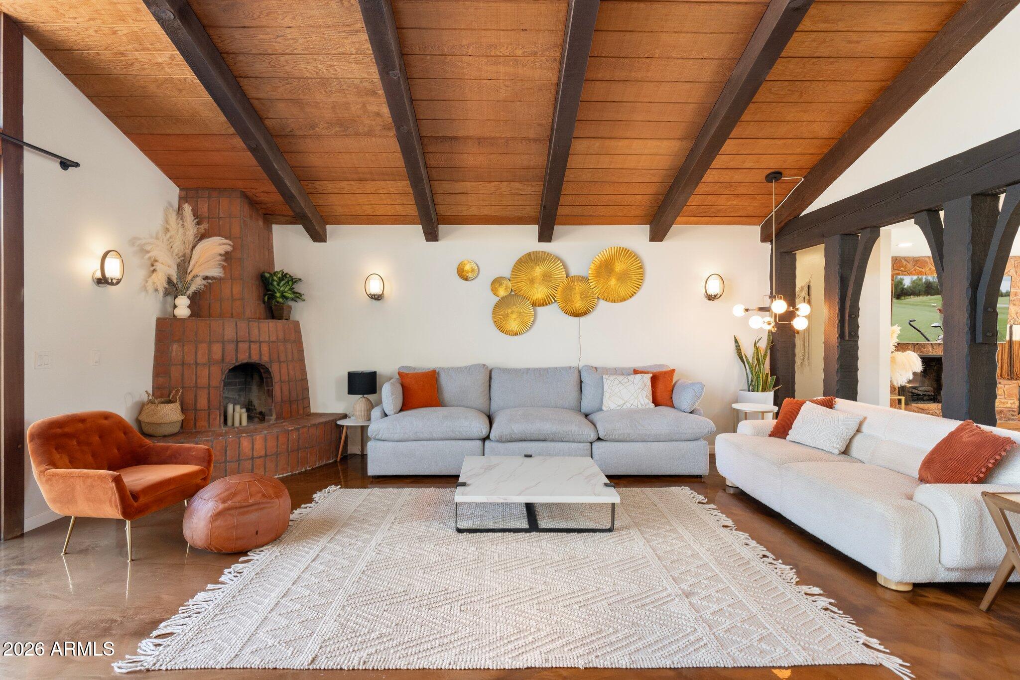 40 Mission Road Sedona, AZ 86336 - Photo 13 of 75 a living room with furniture and a large window