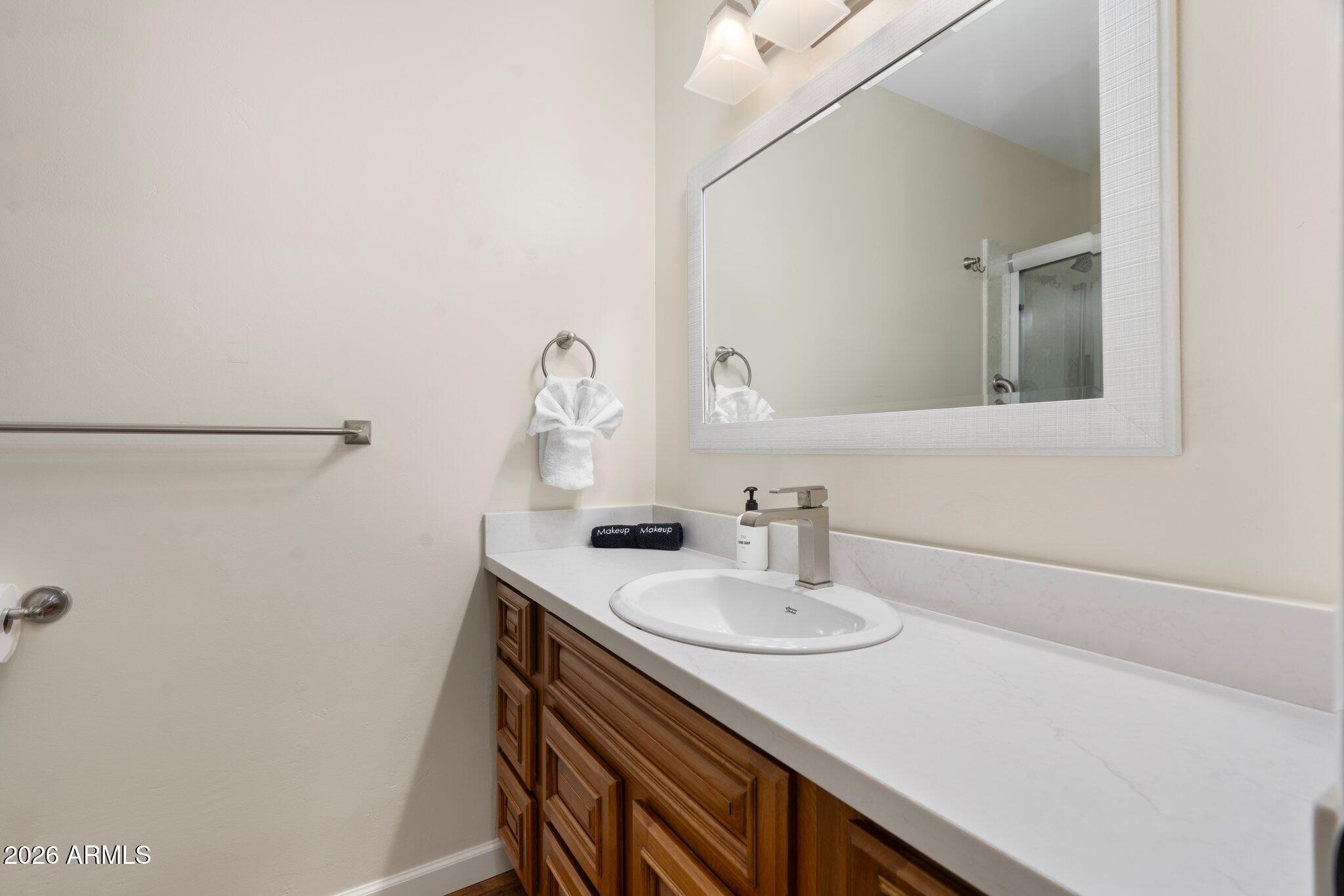 40 Mission Road Sedona, AZ 86336 - Photo 40 of 75 a bathroom with a sink and a mirror