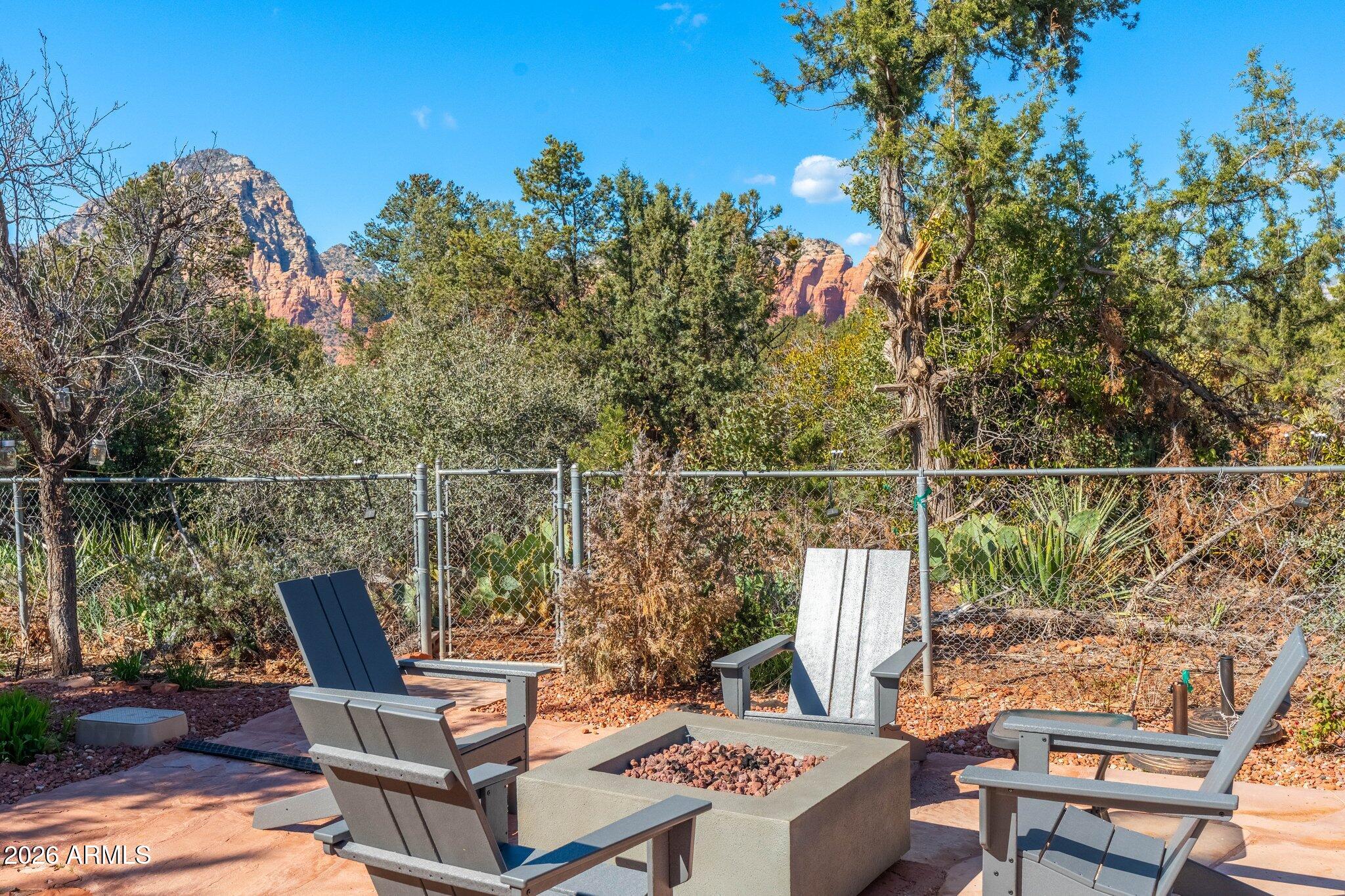 40 Mission Road Sedona, AZ 86336 - Photo 55 of 75 a view of a chairs and table in the terrace