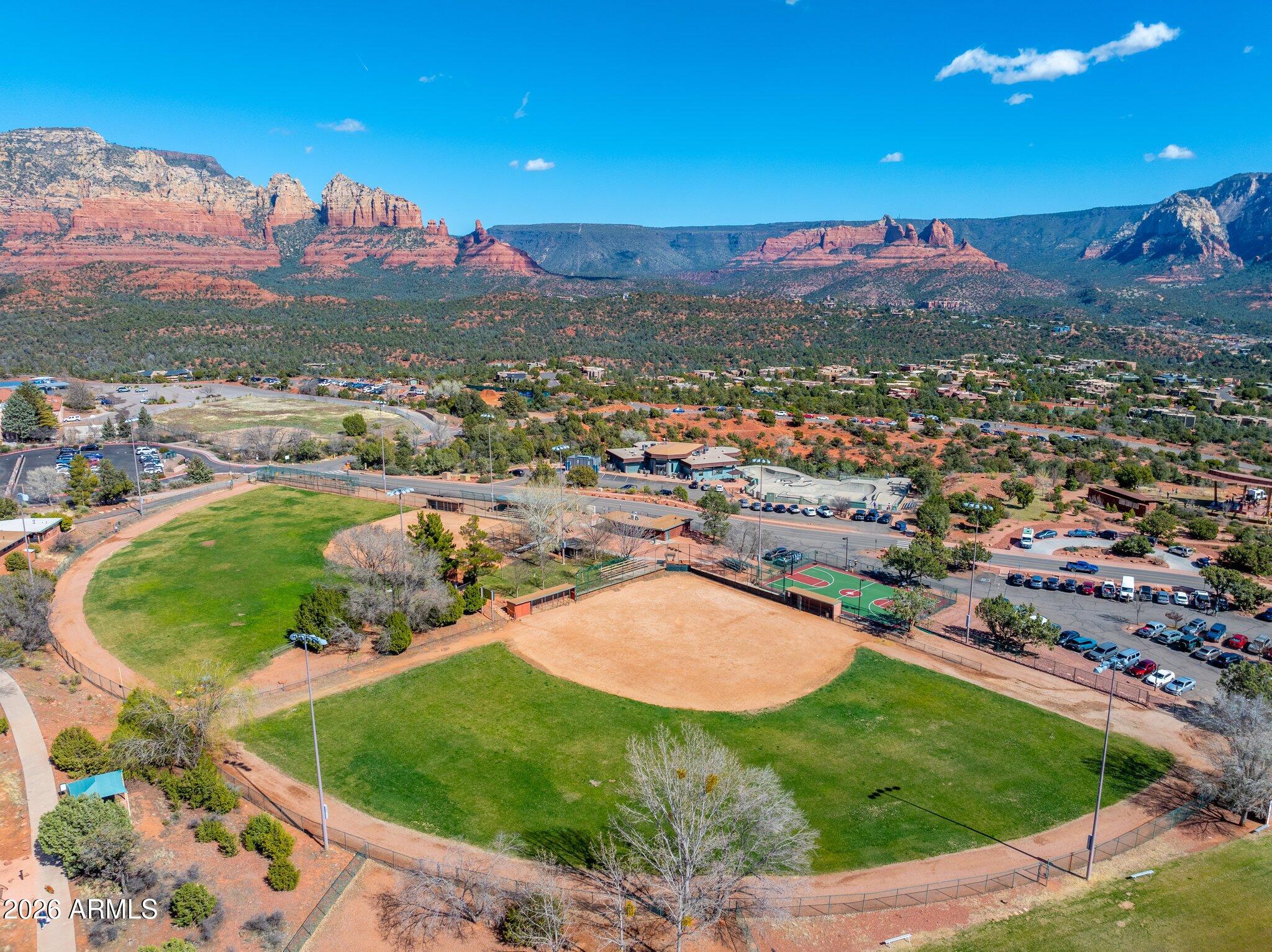 40 Mission Road Sedona, AZ 86336 - Photo 68 of 75 an aerial view of residential houses with outdoor space and trees