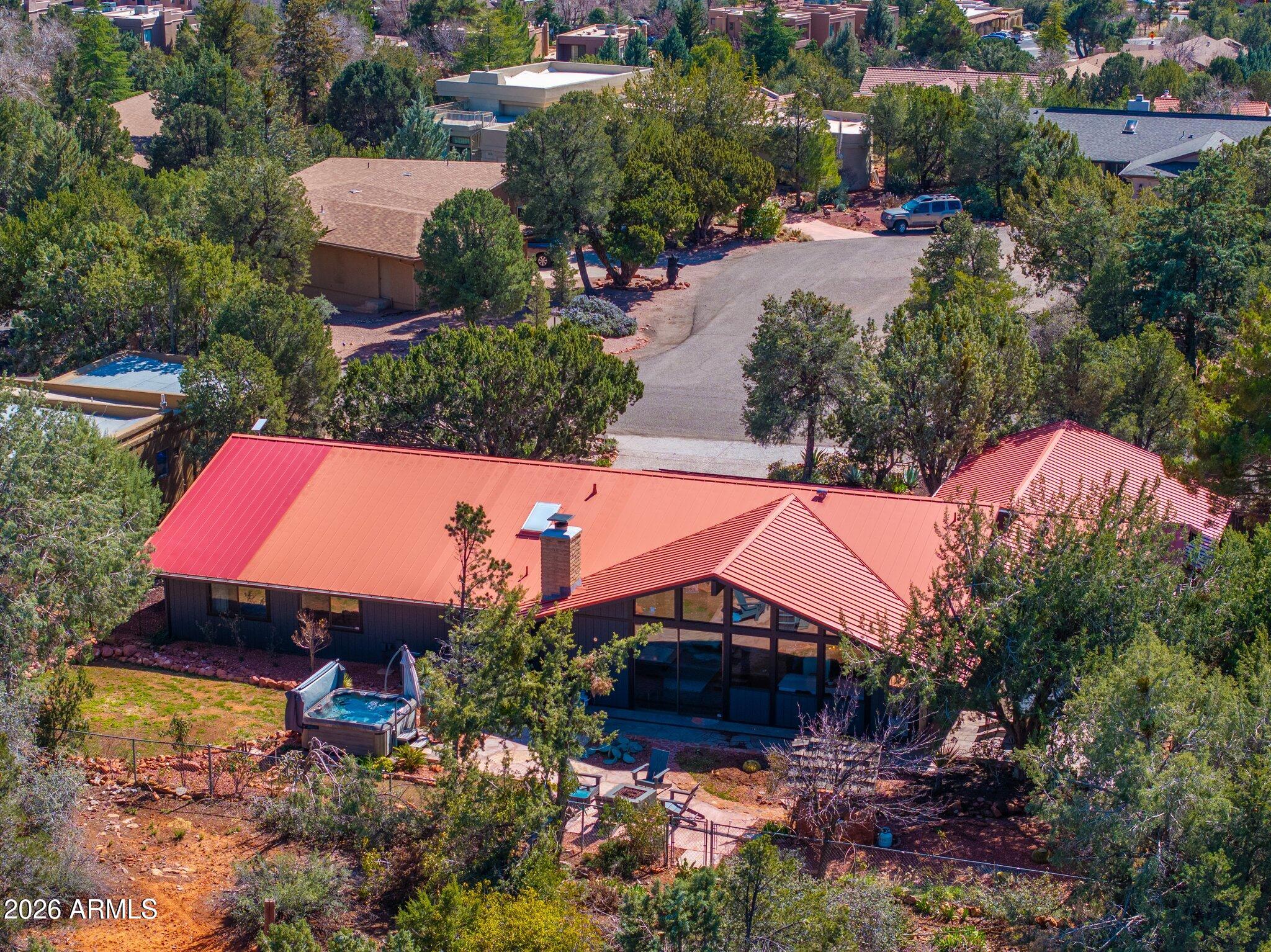 40 Mission Road Sedona, AZ 86336 - Photo 73 of 75 an aerial view of a house with yard swimming pool and outdoor seating