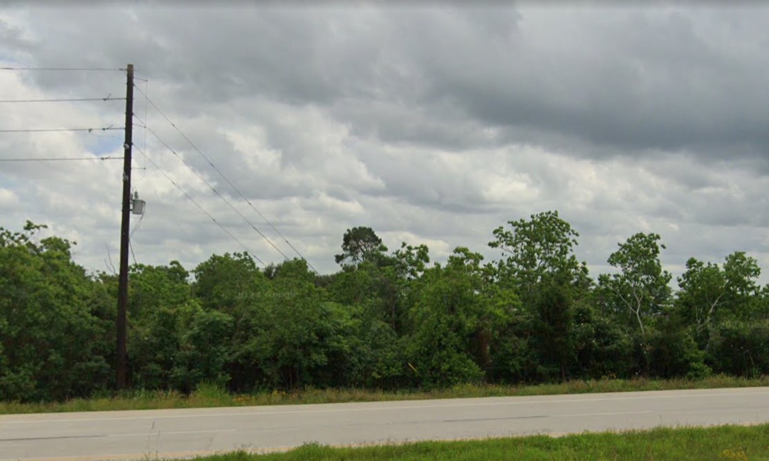 7489 Interstate 10 Frontage Road Sealy, TX 77474 - Photo 4 of 4 a view of a yard