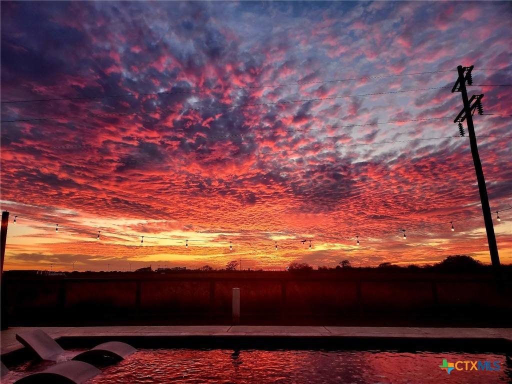 502 Townhall Lane Victoria, TX 77904 - Photo 32 of 35 Beautiful sunset from pool/back patio