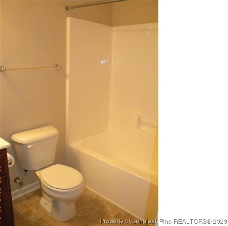 93 Expedition Drive Cameron, NC 28326 - Photo 15 of 19 a white toilet sitting next to a white sink