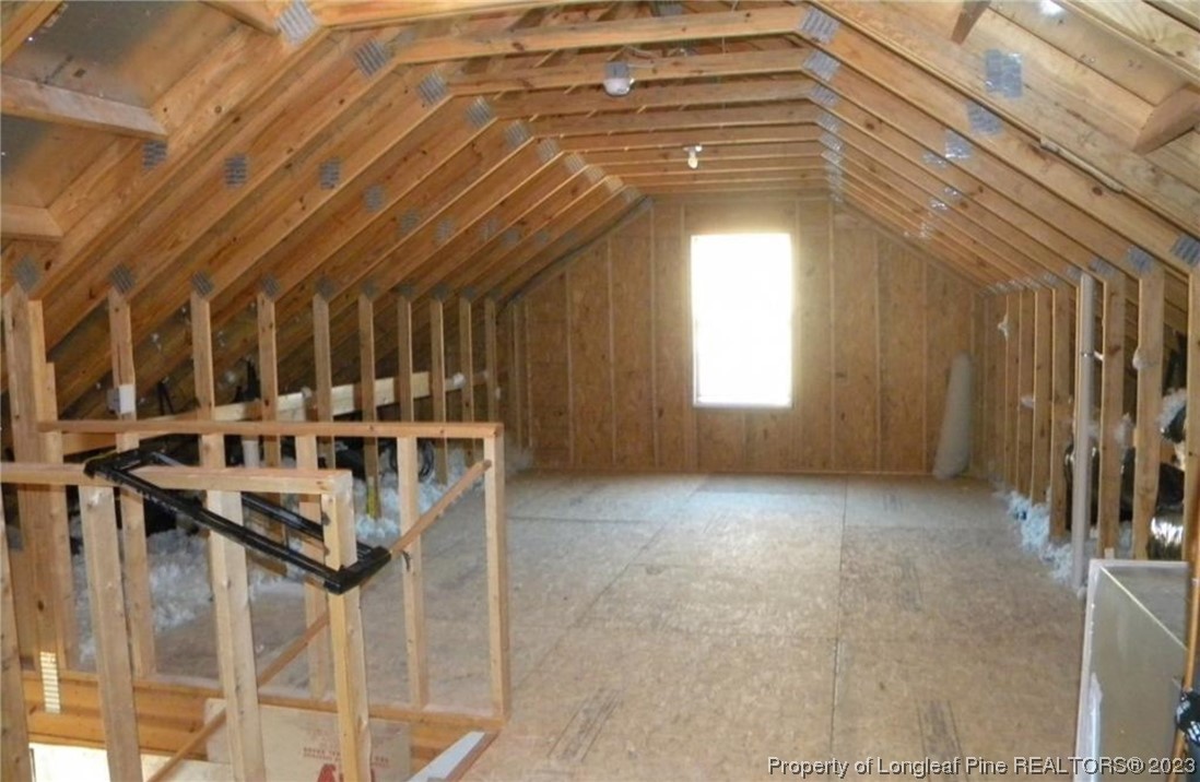93 Expedition Drive Cameron, NC 28326 - Photo 17 of 19 a view of a hallway with windows