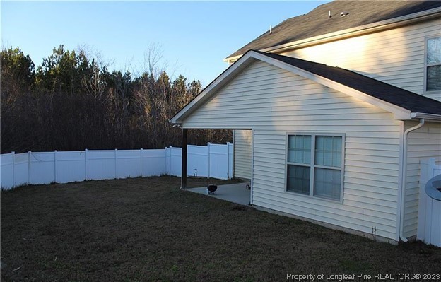 93 Expedition Drive Cameron, NC 28326 - Photo 19 of 19 a view of a house with backyard and trees