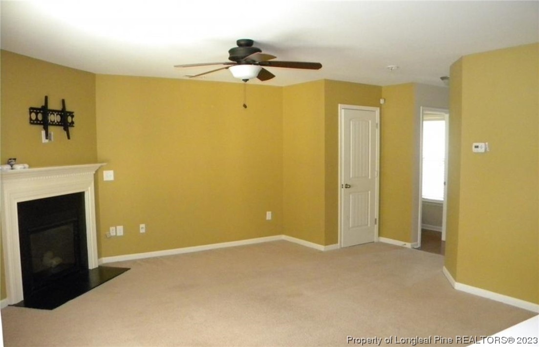 93 Expedition Drive Cameron, NC 28326 - Photo 3 of 19 a view of a livingroom with a ceiling fan